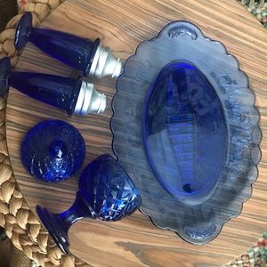 Small blue glass serving set with its historical markings
